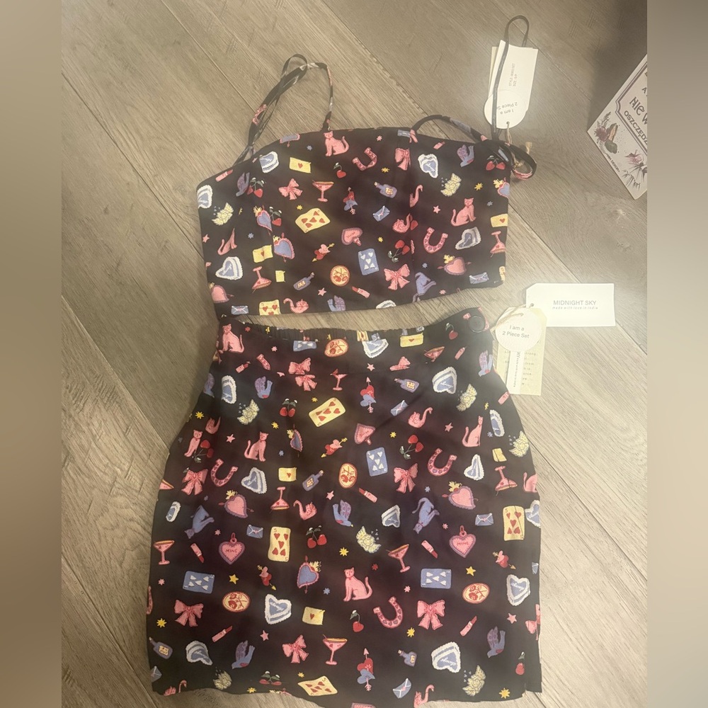 2 piece set. Skirt and top. Size small and medium available